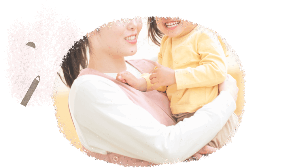 幼児を抱っこするスタッフのイメージ